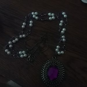 High/low purple medallion necklace